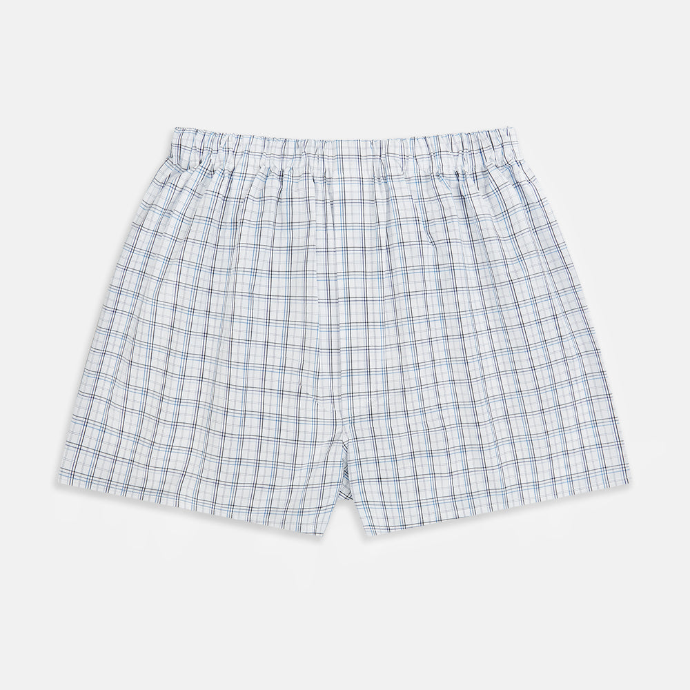 Turnbull & Asser's Blue Multi Graph Check Godfrey Boxer Shorts for men in Italian cotton feature a white base with a blue and black plaid pattern, shown flat against a plain white background.