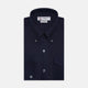 The Turnbull & Asser Navy Cashmere Cotton Shirt is a formal, dark navy blue shirt with a collar and front pocket, crafted from a luxurious cotton and cashmere blend, shown neatly folded against a white background.