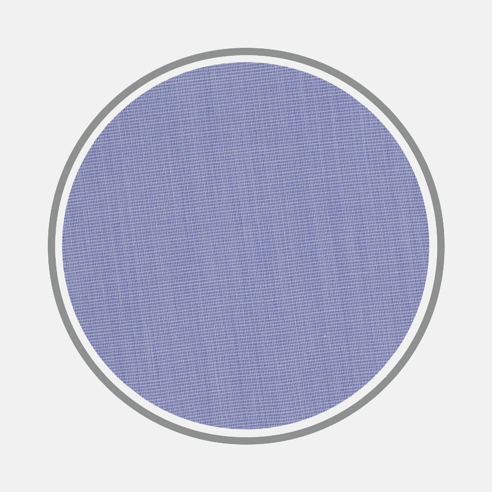 A close-up of Turnbull & Asser's Blue End-on-End Sea Island Quality Cotton Fabric, framed by a circular gray and white border on a plain white background.