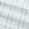 View 6 of product The Turnbull & Asser Dark Green Grid Check Mayfair Shirt features a white base with blue and dark green checks, a classic T&A collar, buttoned cuffs, and a Mayfair fit. The long-sleeve shirt is shown laid flat on a white background.
