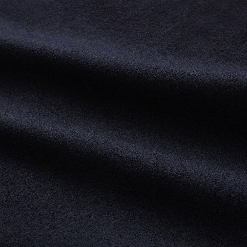 The Turnbull & Asser Navy Single-breasted Waistcoat is a sleeveless wool-cashmere piece with a small chest pocket and two side pockets, shown against a white background—an ideal addition to your winter wardrobe.