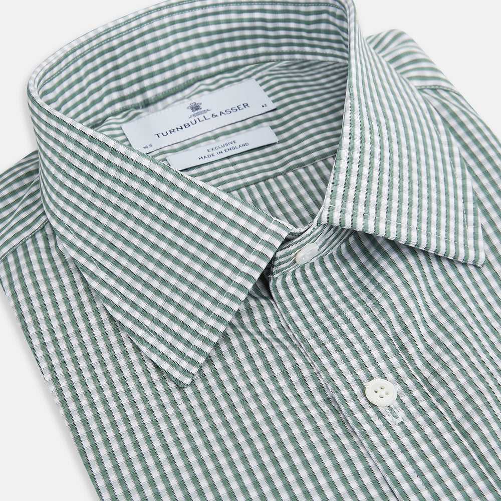 The Turnbull & Asser Green Fine Check Mayfair Shirt, crafted from fine Italian cotton with a pointed collar and buttoned cuffs, is shown laid flat on a white background.