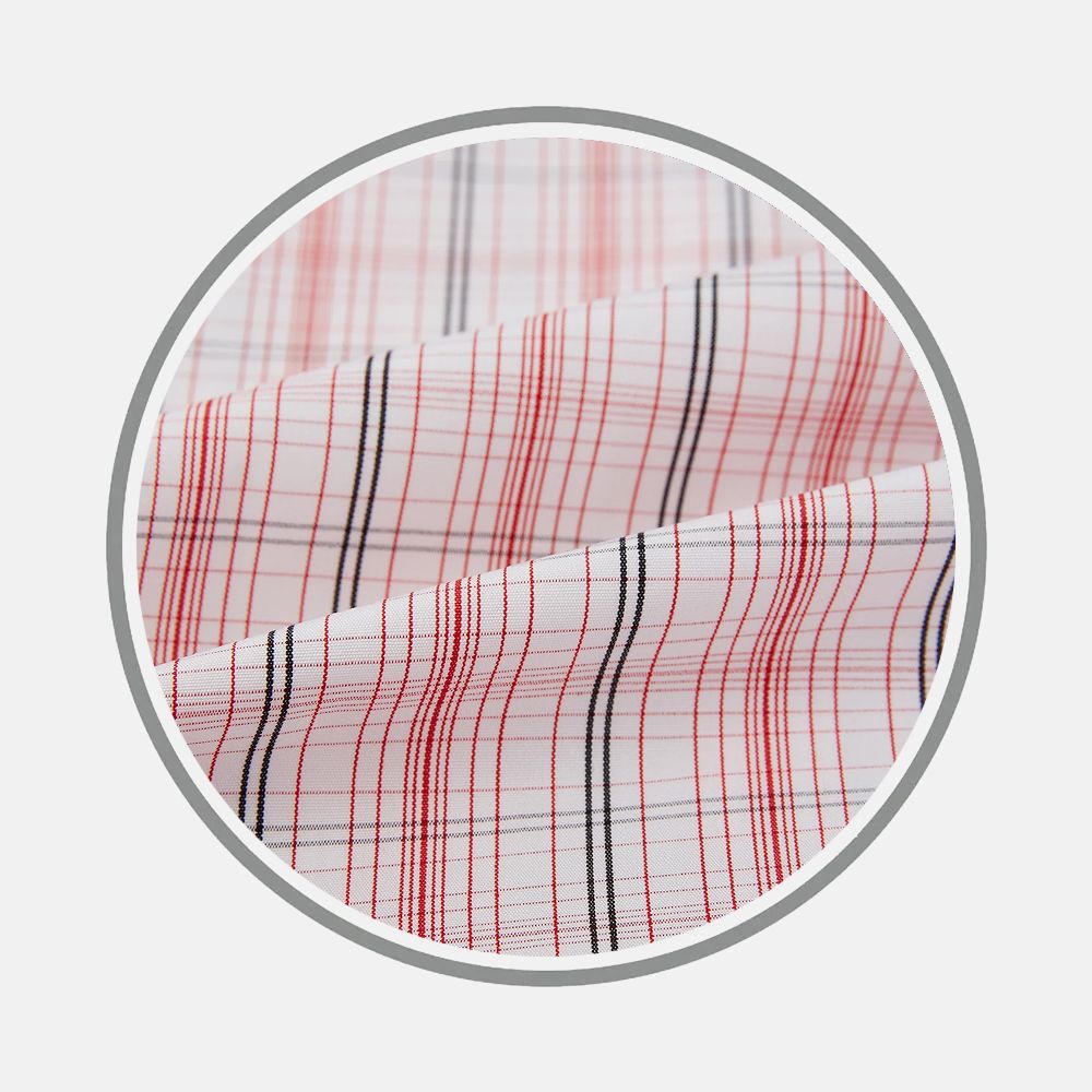 Close-up of Turnbull & Asser's Red Multi Check Fabric, showcasing a white base with thin red and black checkered lines. The fabric is gently folded within a circular frame against a plain light background.