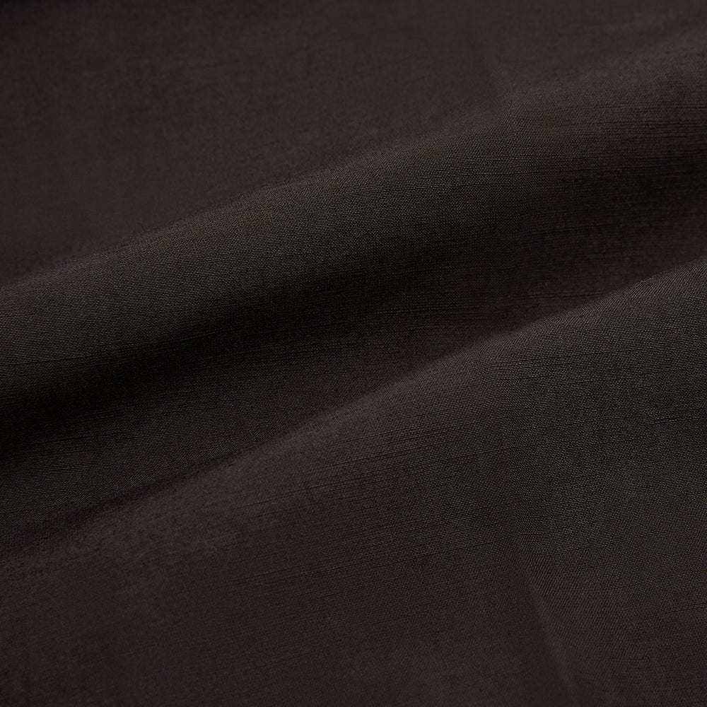 A pair of brown linen Henry trousers by Turnbull & Asser with a straight-leg cut and button waistband, ideal for formalwear, displayed against a plain white background.