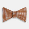 View 1 of product The Turnbull & Asser Brown and White Diamond Silk Bow Tie features a diamond pattern, ideal for formal occasions, showcased on a white background.