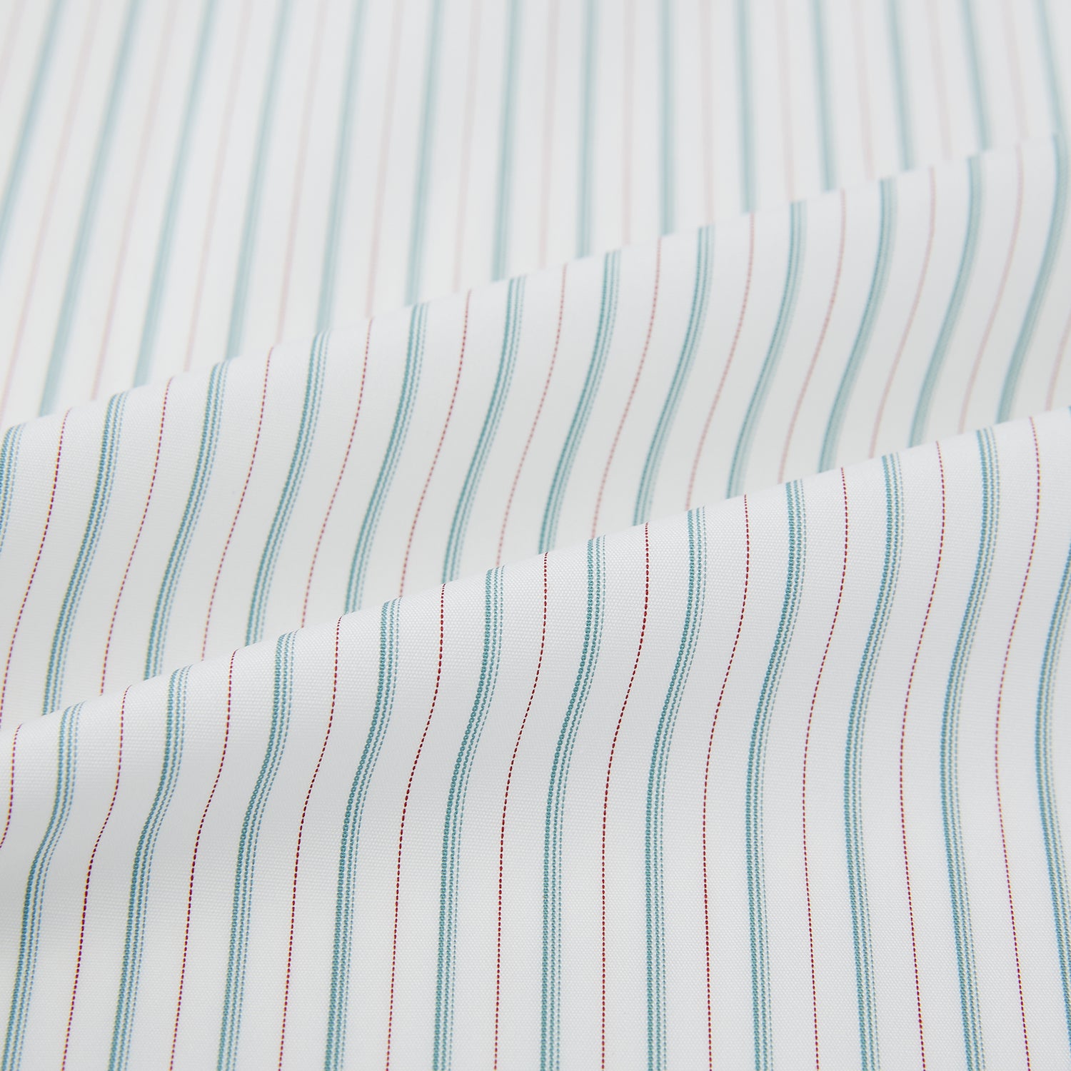 View 8 of product The Turnbull & Asser Turquoise and Red Ticking Stripe Windsor Shirt, featuring a classic collar and buttoned cuffs, is displayed flat against a white background.