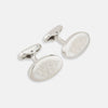 View 1 of product Turnbull & Asser Silver Antique Floral Oval Cufflinks feature engraved floral designs on oval faces, shown against a white background.