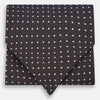 View 1 of product The White and Brown Micro Dot Silk Cravat from Turnbull & Asser adds refined style to any outfit with its subtle dotted pattern and luxurious silk fabric.
