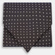 The White and Brown Micro Dot Silk Cravat from Turnbull & Asser adds refined style to any outfit with its subtle dotted pattern and luxurious silk fabric.