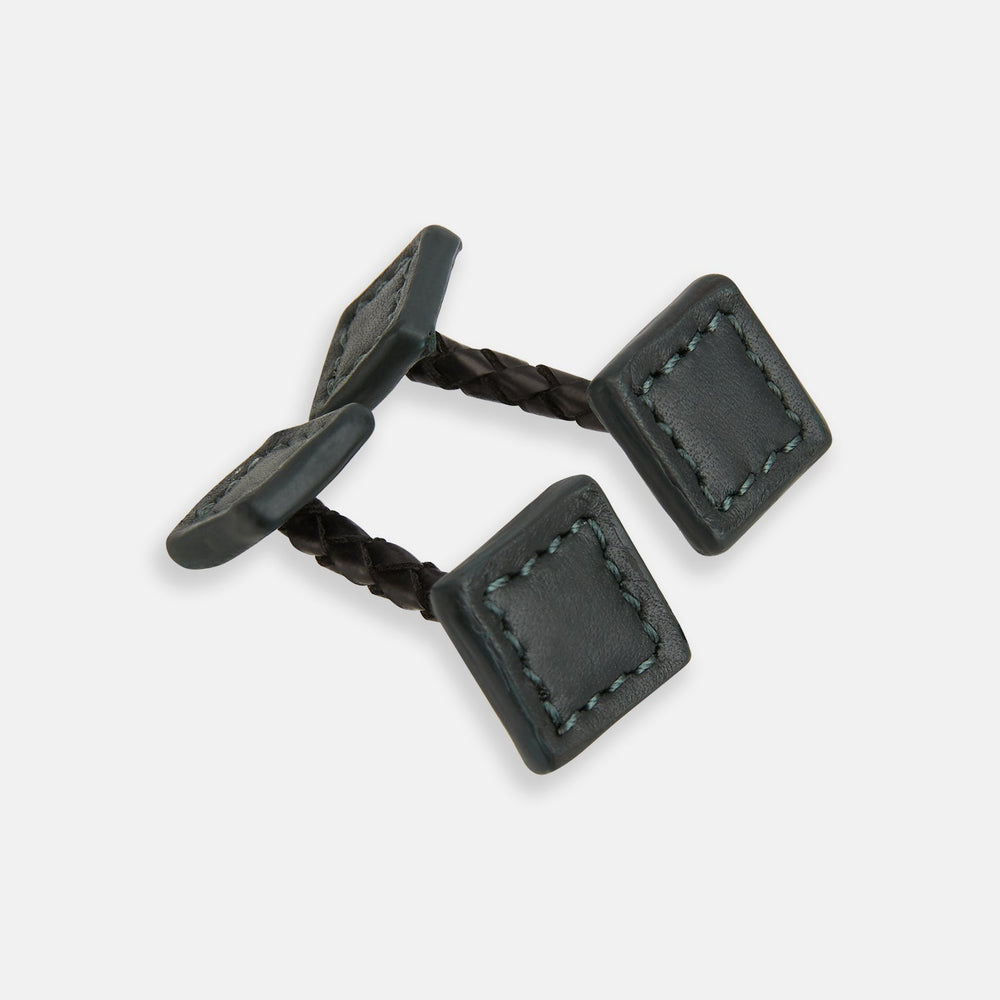 Turnbull & Asser Forest Green Leather Cufflinks feature square ends, visible stitching, and braided leather connectors, displayed on a white background—a refined choice in men's accessories.