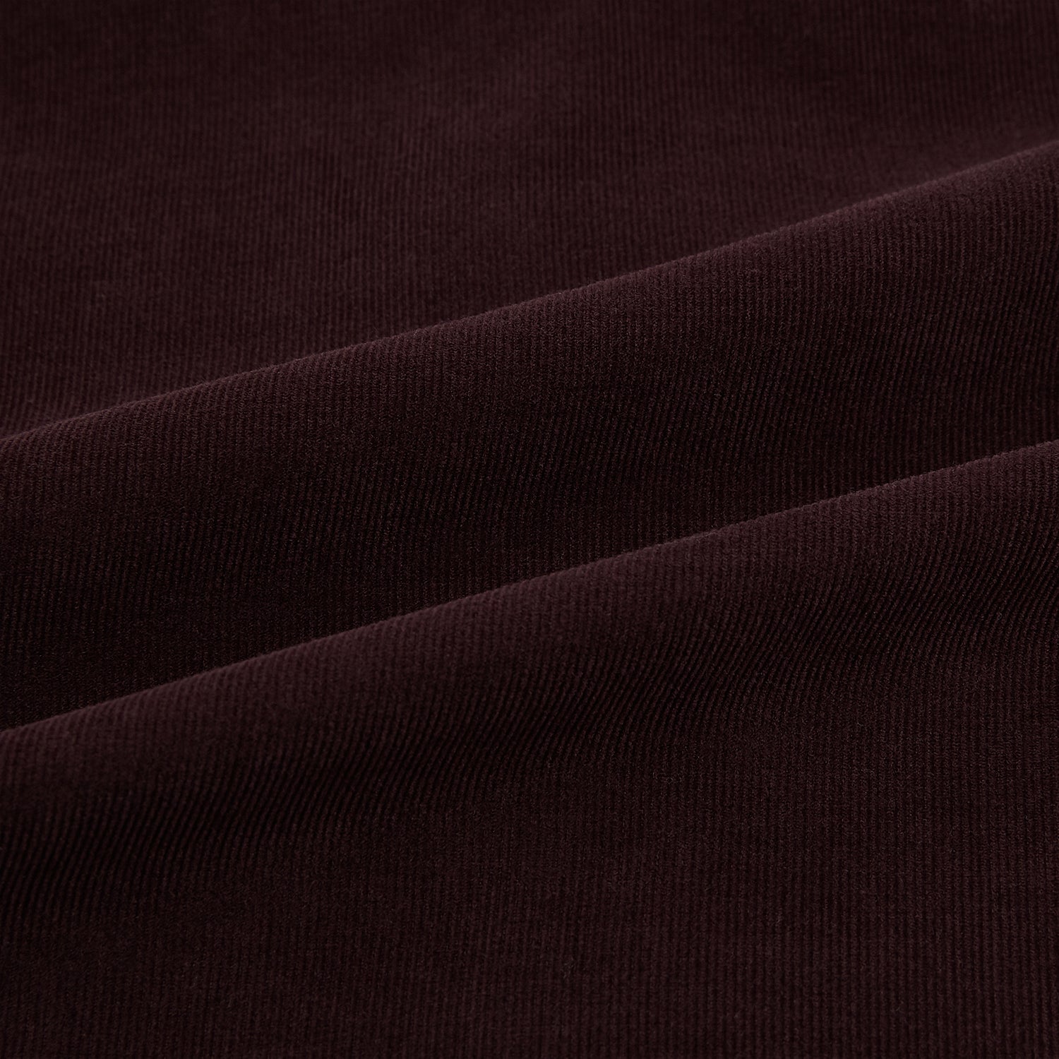 View 7 of product The Turnbull & Asser Burgundy Corduroy Hampstead Overshirt features long sleeves, a collar, a large left chest pocket, and two zippered side pockets, shown laid flat on a plain white background.
