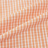 View 6 of product The Turnbull & Asser Orange Micro Check Mayfair Shirt, a long-sleeve button-up with a classic T&A collar and white-orange micro check pattern, is shown neatly laid flat on a white background.