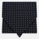 The Green Micro Dot and Navy Silk Cravat by Turnbull & Asser features fine green micro dots on navy silk, adding a refined touch to formalwear. Pair it with a matching pocket square for a cohesive, polished look.