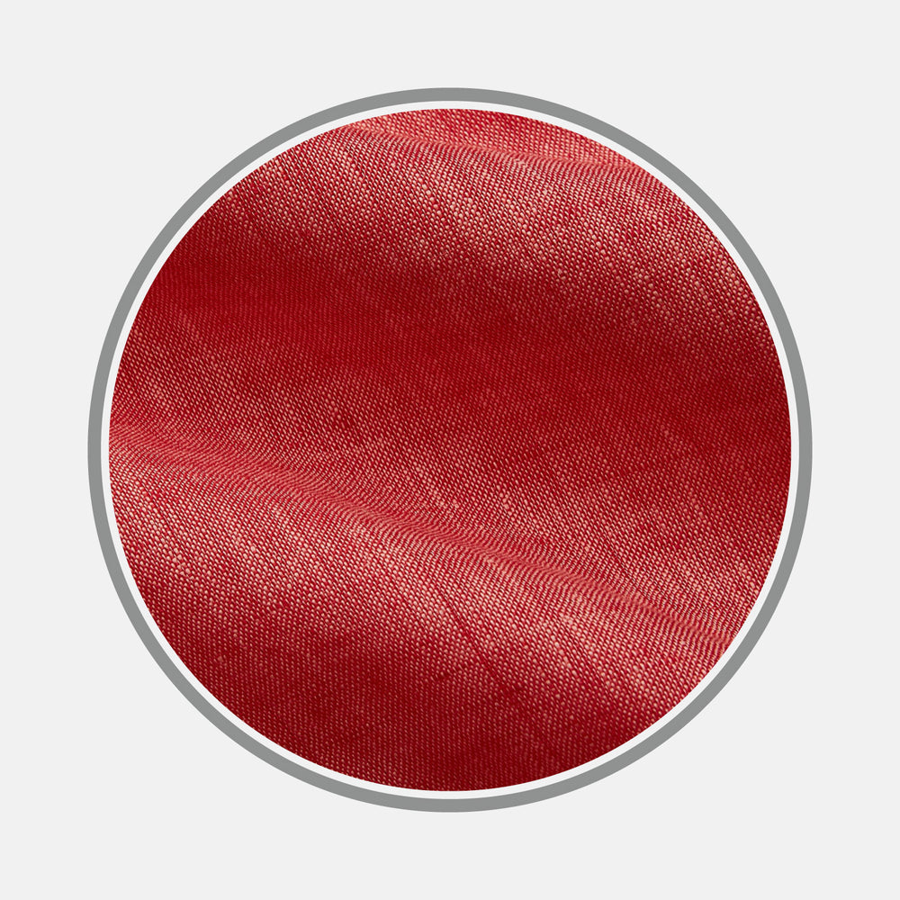 Close-up of Turnbull & Asser Pink Plain Linen Fabric, highlighting its fine weave and slight sheen within a circular frame on a light gray background.