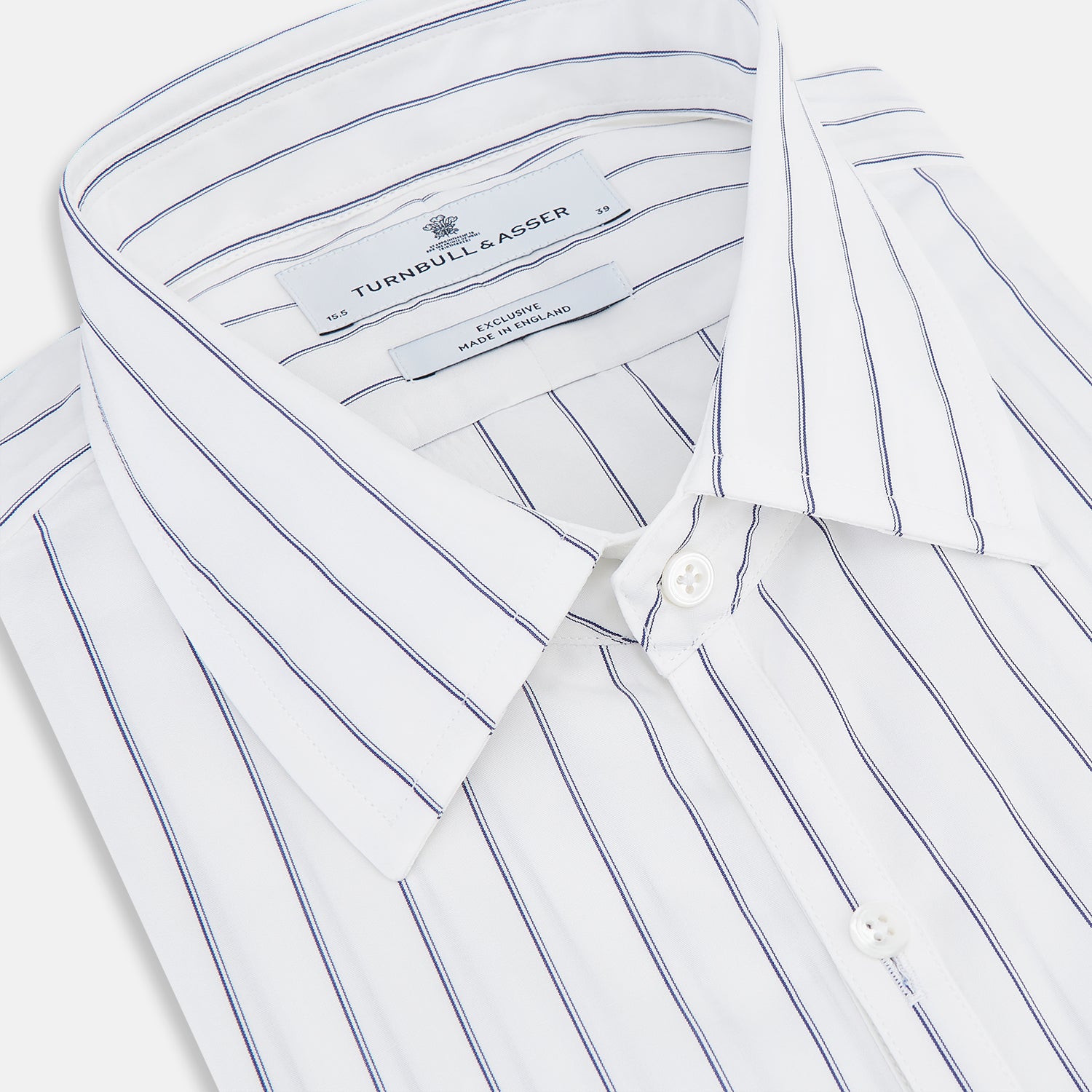 View 2 of product The Dark Navy Double-Pinstripe Westminster Shirt by Turnbull & Asser, featuring a Turnbull collar and cuffed sleeves, is displayed laid flat on a plain white background, highlighting its British craftsmanship.