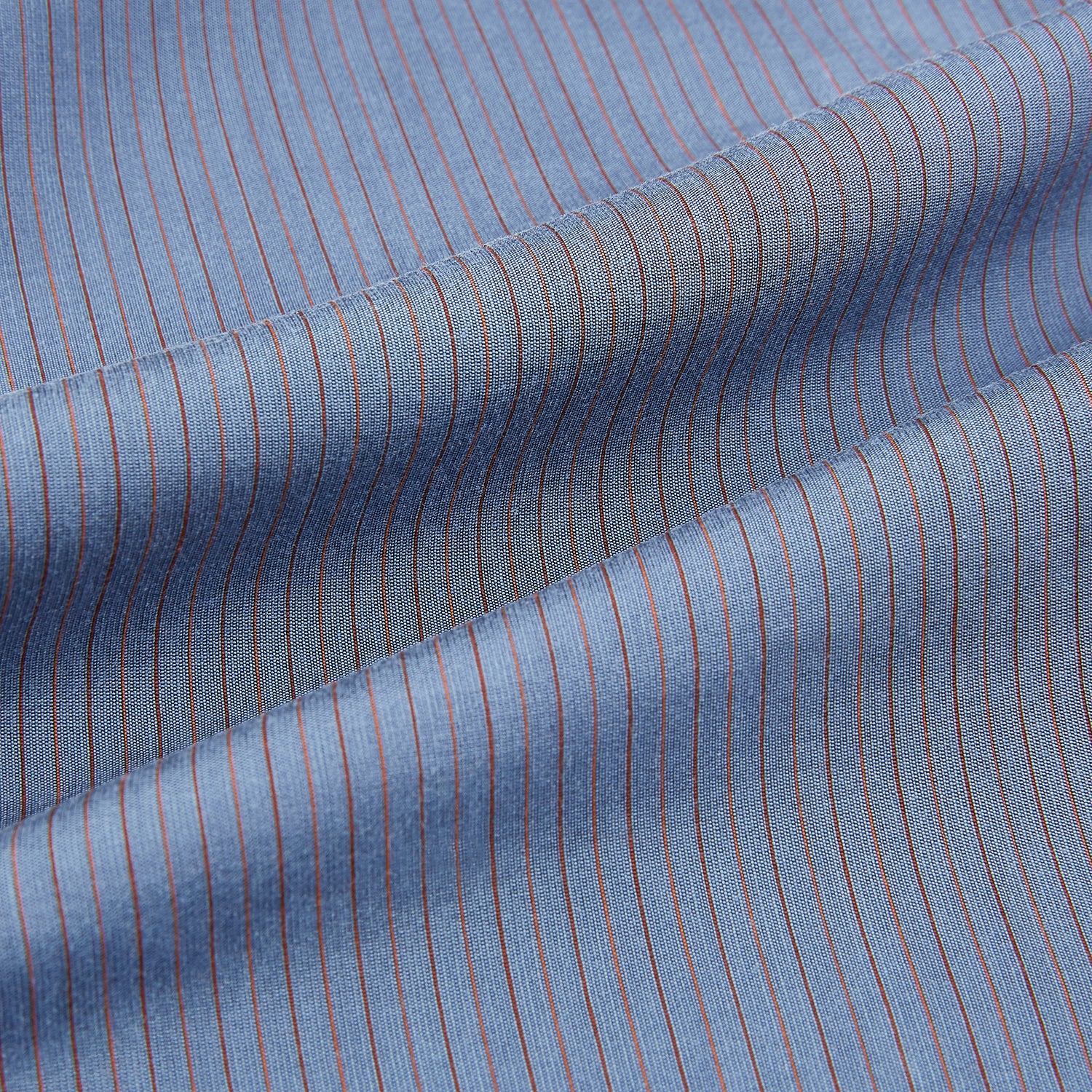 View 4 of product A neatly folded men's Mid Blue Red Stripe Regular Fit Mayfair Shirt by Turnbull & Asser, featuring long sleeves, classic collar, white buttons, and subtle red stripes—a hallmark of the brand’s renowned luxury.