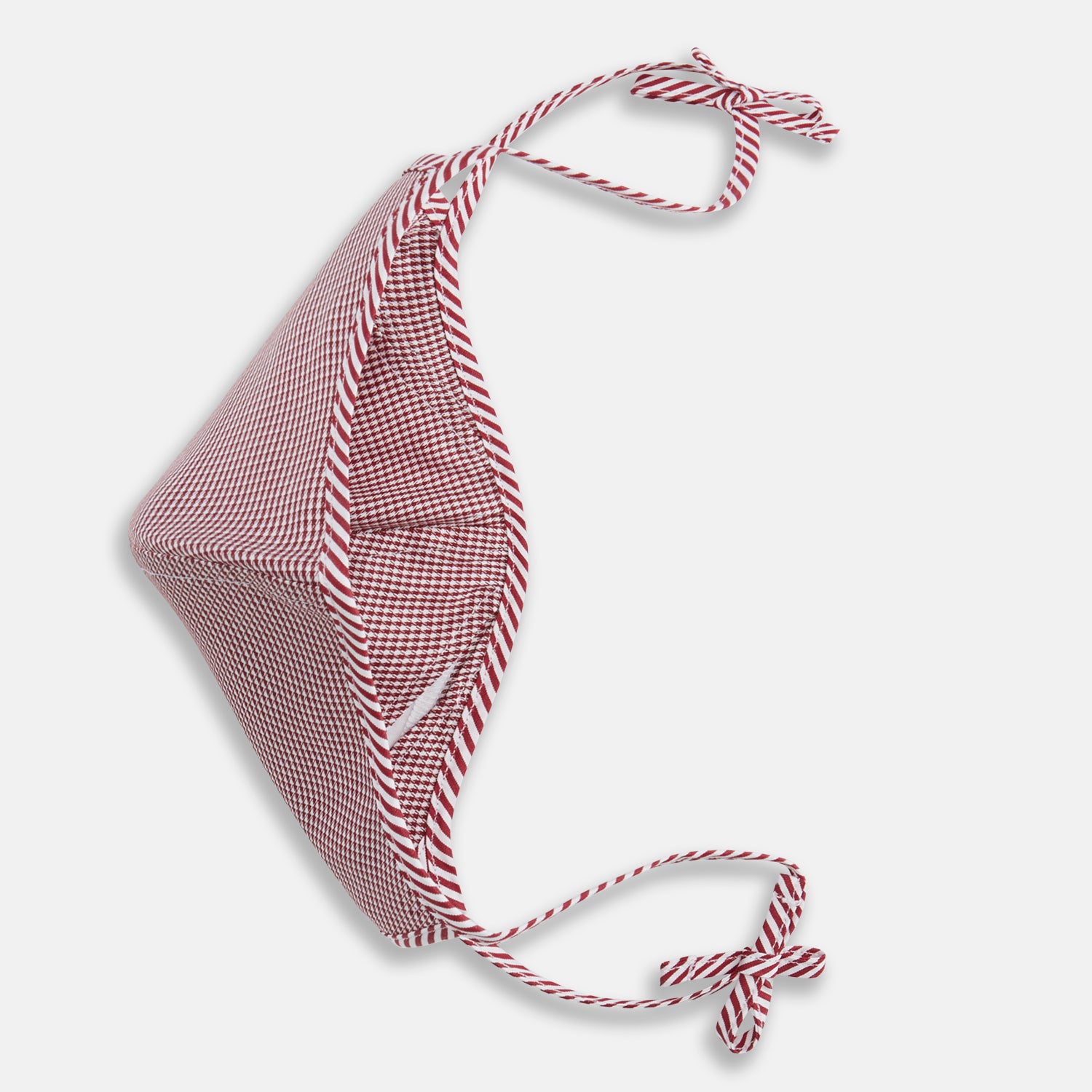 View 3 of product The Turnbull & Asser Burgundy Check Commuter Mask comes with 3 Viroformula™ filters. It features a check pattern, adjustable ear straps, and is displayed on a plain white background.