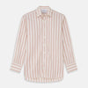 View 1 of product The Pink and Sandstone Stripe Cotton Regular Fit Mayfair Shirt by Turnbull & Asser features vertical pink and sandstone stripes on white, a T&A collar, wide cuffs, and a slightly curved hem for refined detail.
