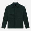 View 1 of product The Forest Green Greenwich Knitted Overshirt by Turnbull & Asser, crafted from Italian wool, features long sleeves, a collar, front buttons, and two chest pockets—one flap, one open—shown on a white background.
