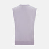 View 3 of product The Turnbull & Asser Lilac Cashmere Round Neck Vest is a sleeveless piece with a ribbed hem, ideal as a lightweight layer, shown here on a plain white background.