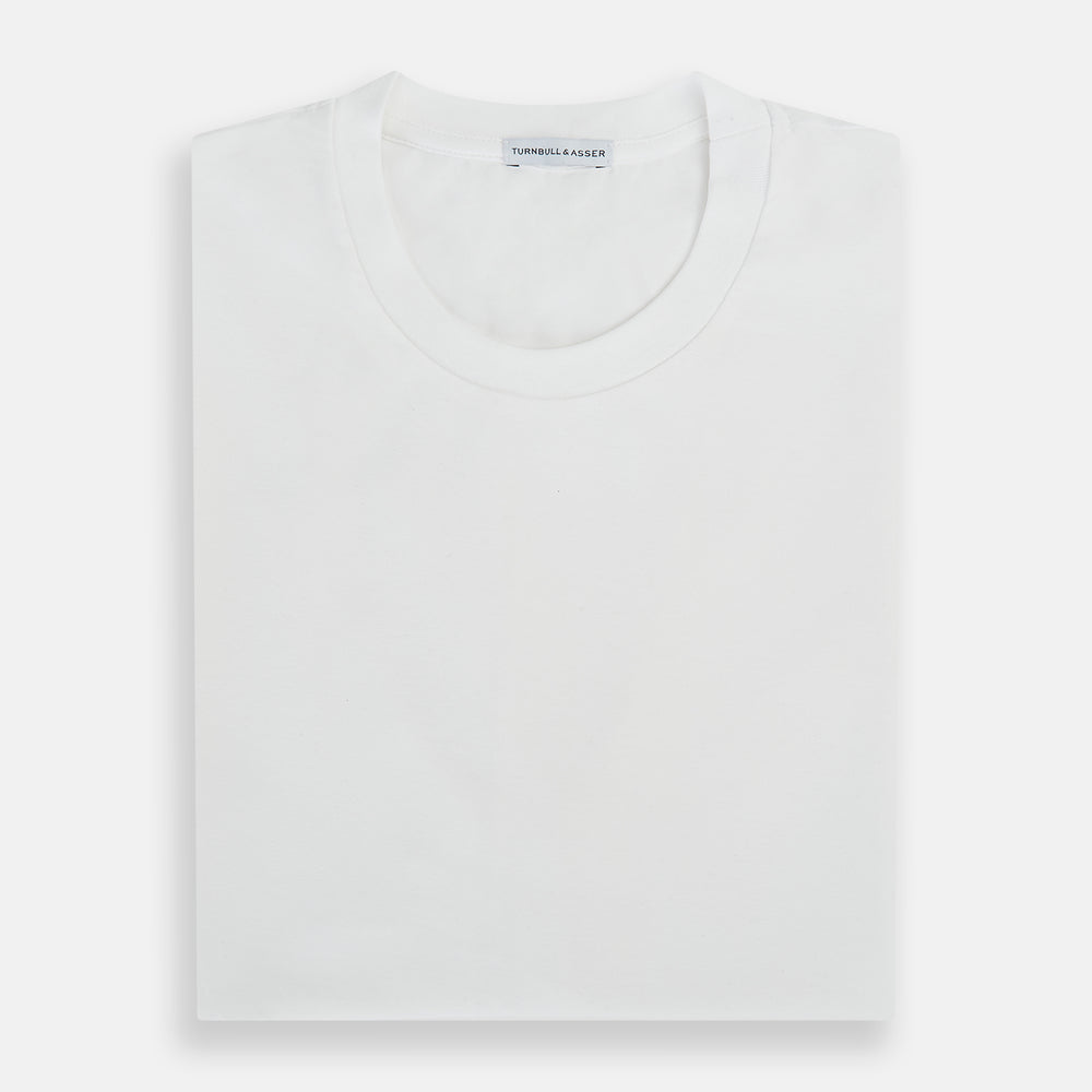 Experience comfort in the Turnbull & Asser White Short-sleeve Pyjama Shirt—a plain crew neck T-shirt laid flat on a white background, perfect as elevated loungewear or a sleek pyjama essential.