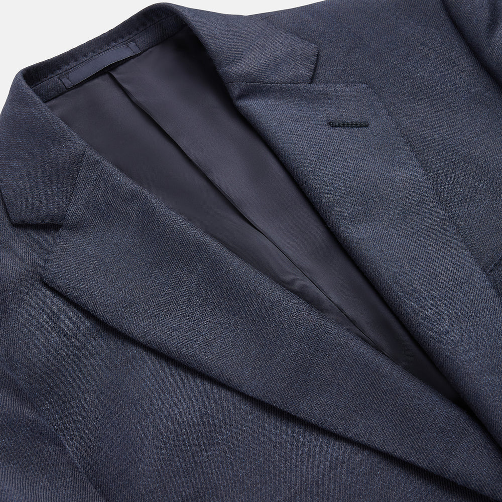 The Turnbull & Asser Navy Wool Blend Barrington Blazer features a notched lapel, single-button closure, three front pockets, and sleeve button accents, shown against a plain white background.