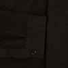 View 4 of product The Turnbull & Asser Dark Chocolate Greenwich Knitted Overshirt is crafted from Italian wool, with a classic collar, two flap chest pockets, and a concealed button front—offering a sleek cardigan alternative. Shown on a white background.