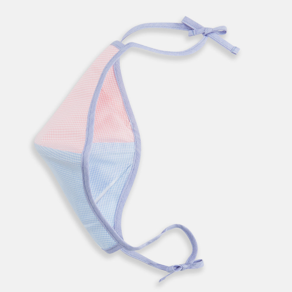 The Turnbull & Asser Pink & Blue Check Commuter Mask features lavender adjustable ear loops tied in bows and comes with 3 Viroformula™ filters. Shown on a plain white background.