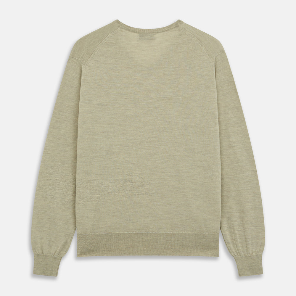 A light green Kennedy Merino V-neck jumper by Turnbull & Asser is laid flat on a white background. This knitwear piece features ribbed cuffs and hem, offering a simple, classic design ideal for any wardrobe.