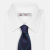 View 2 of product The Turnbull & Asser Green and Navy Window Pane Silk Tie features a subtle ribbed texture with a diagonal green grid pattern, inspired by archival designs—a stylish choice for modern office attire.