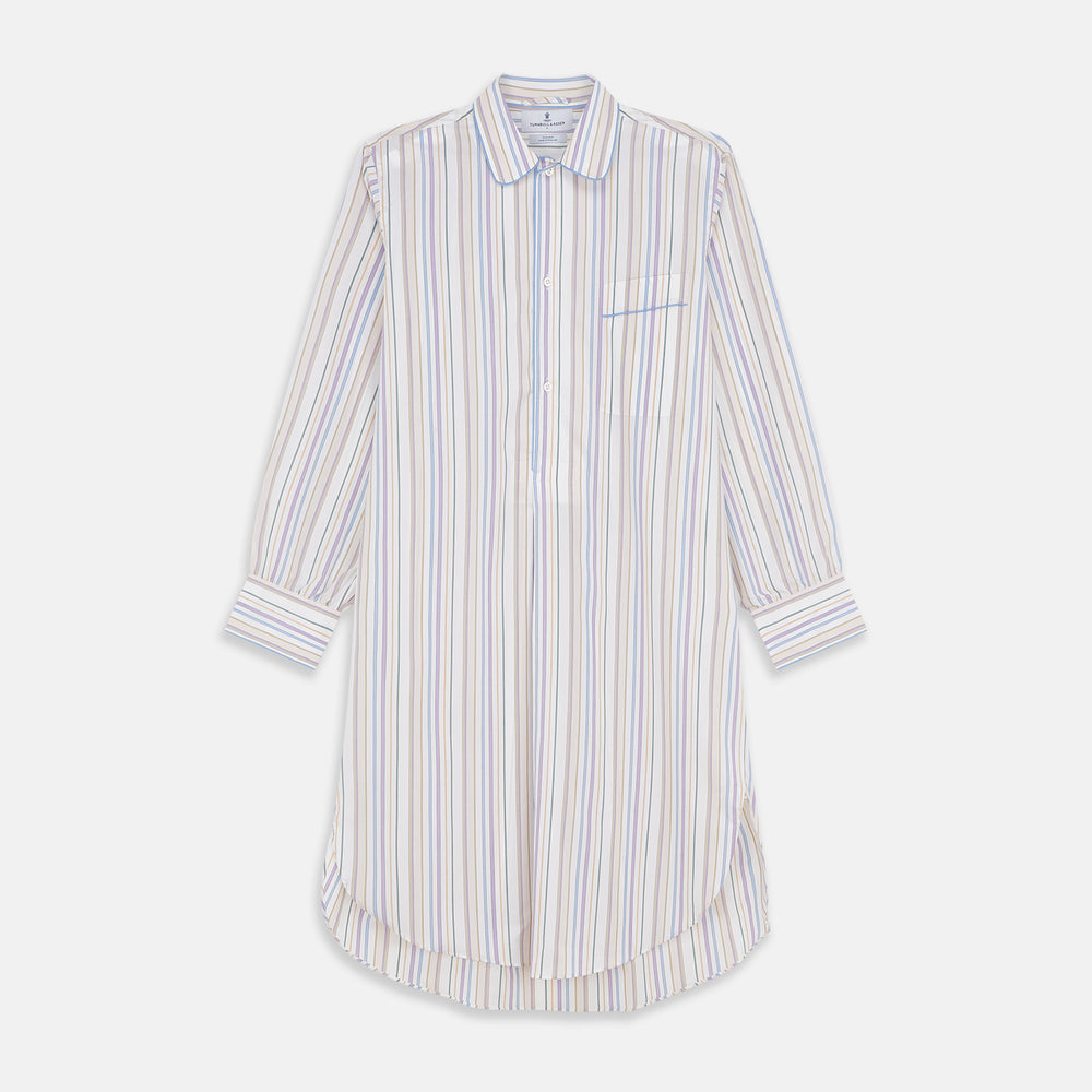 The Turnbull & Asser Colourful Garden Multi Stripe Cotton Sussex Nightshirt is UK-made, featuring vibrant stripes on white for timeless style and luxurious sleepwear comfort.
