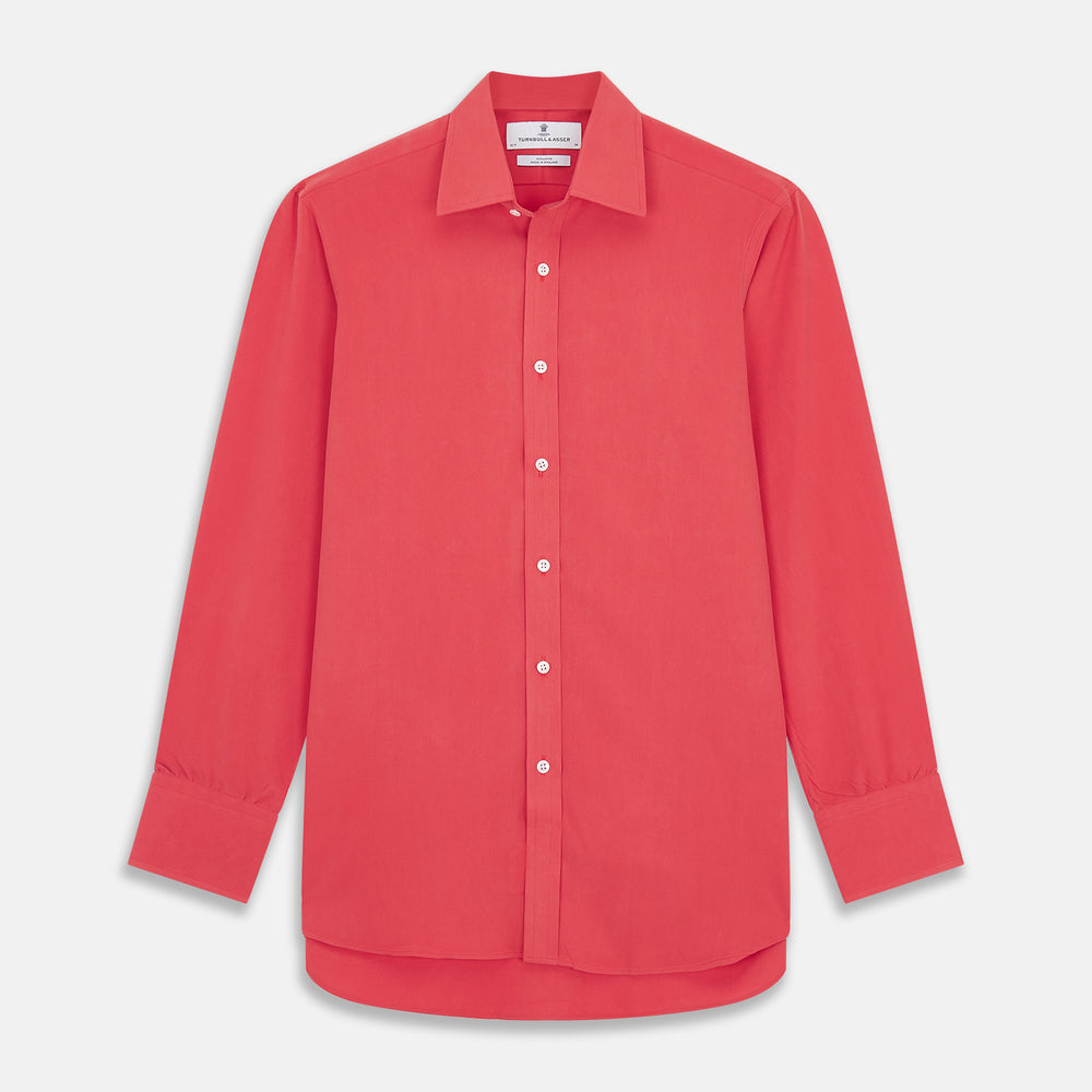 The Turnbull & Asser Coral Pink Silk Regular Fit Mayfair Shirt features long sleeves, a classic collar, and white buttons, displayed laid flat on a plain white background.