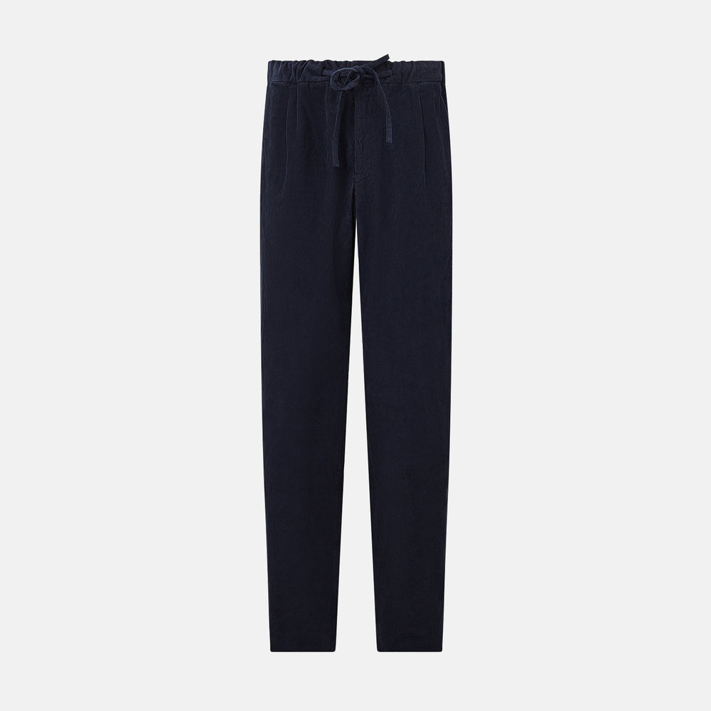 Turnbull & Asser's Light Navy Corduroy Miles Trousers feature a straight-leg stretch fit, elasticated waist, and matching fabric drawstring, shown on a plain white background.