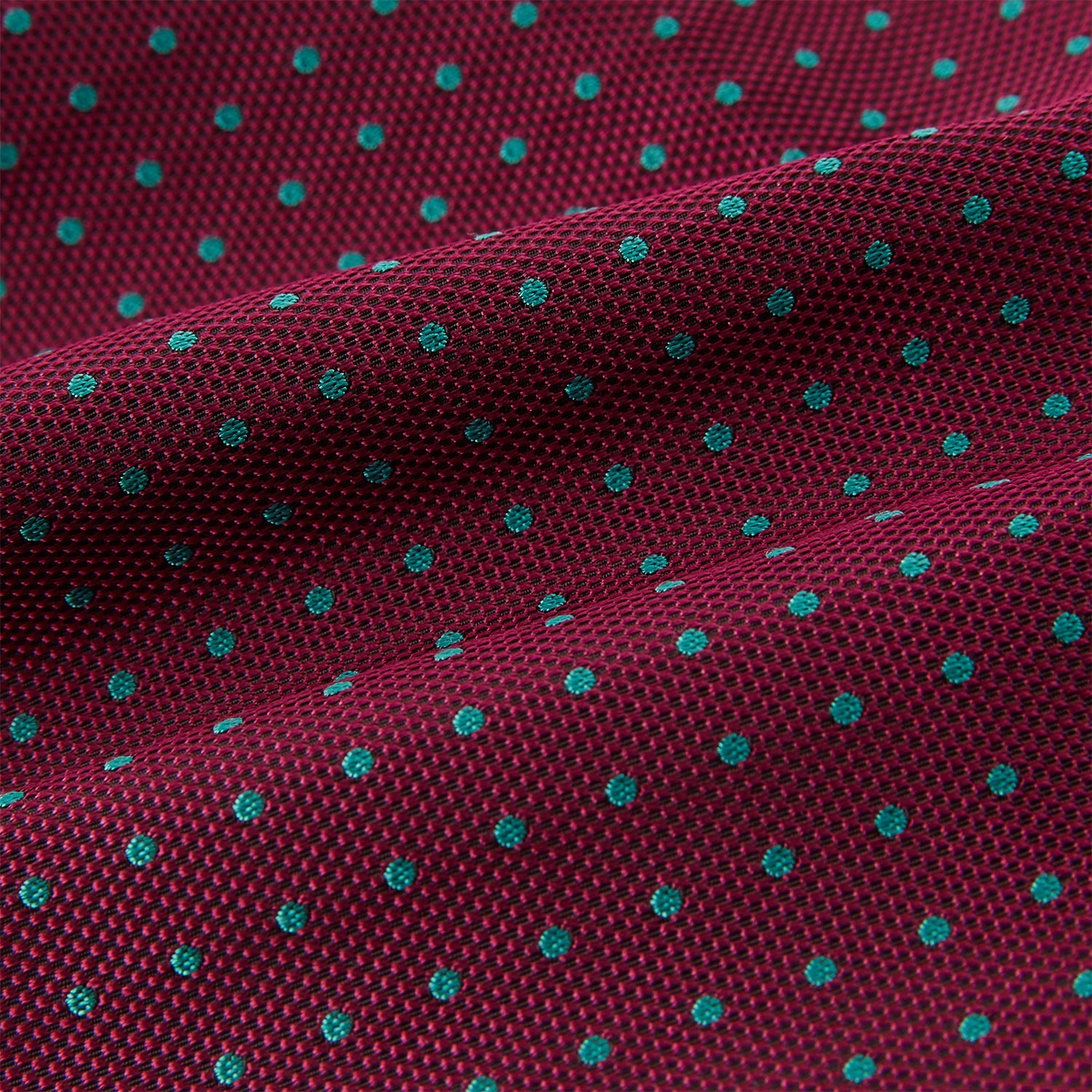 View 4 of product The Turnbull & Asser Blue and Burgundy Micro Dot Silk Cravat features a subtle pattern, making it a refined formal accessory that adds elegance to your outfit.