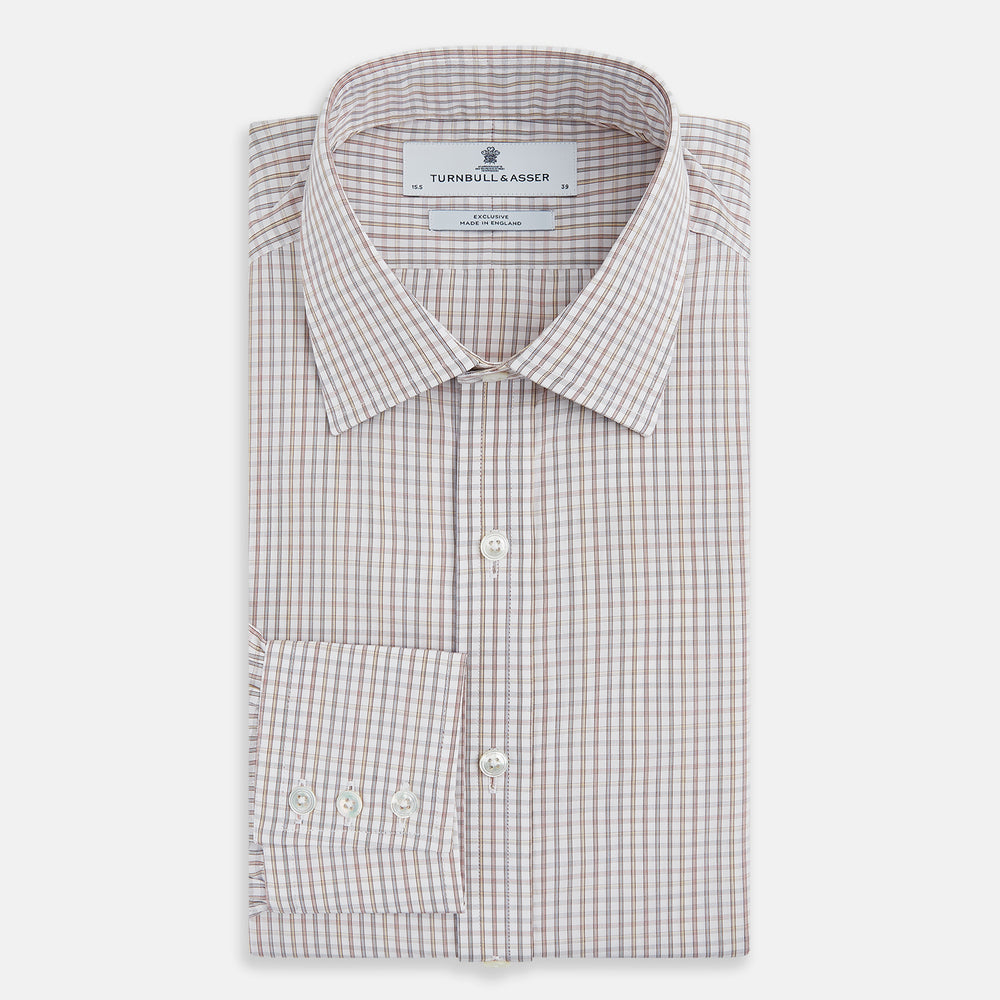 The Turnbull & Asser Multicoloured Check Mayfair Shirt is a long-sleeve, button-up shirt with a classic collar and buttoned cuffs, showcasing a true British checkered pattern on a white background.