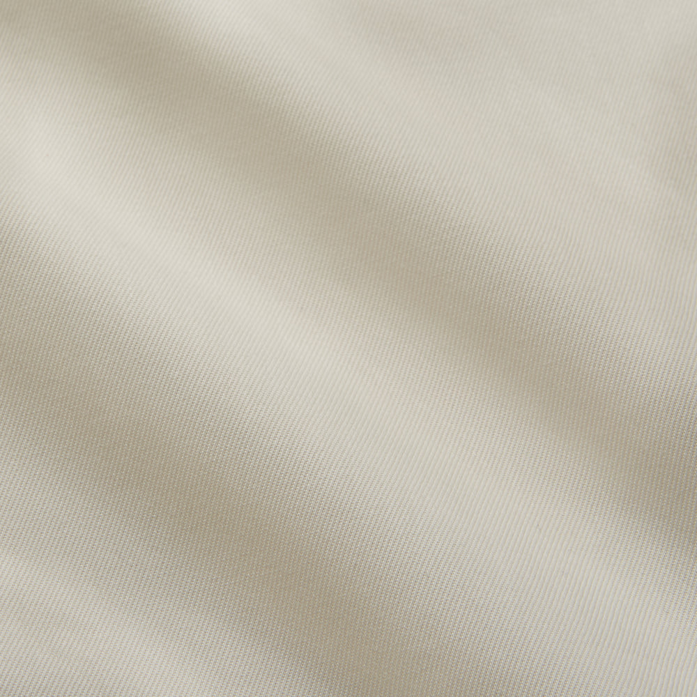 The Cream Cotton Weekend Fit Western Shirt with Dorset Collar by Turnbull & Asser features two chest pockets and is laid flat on a white background—ideal for smart-casual style.