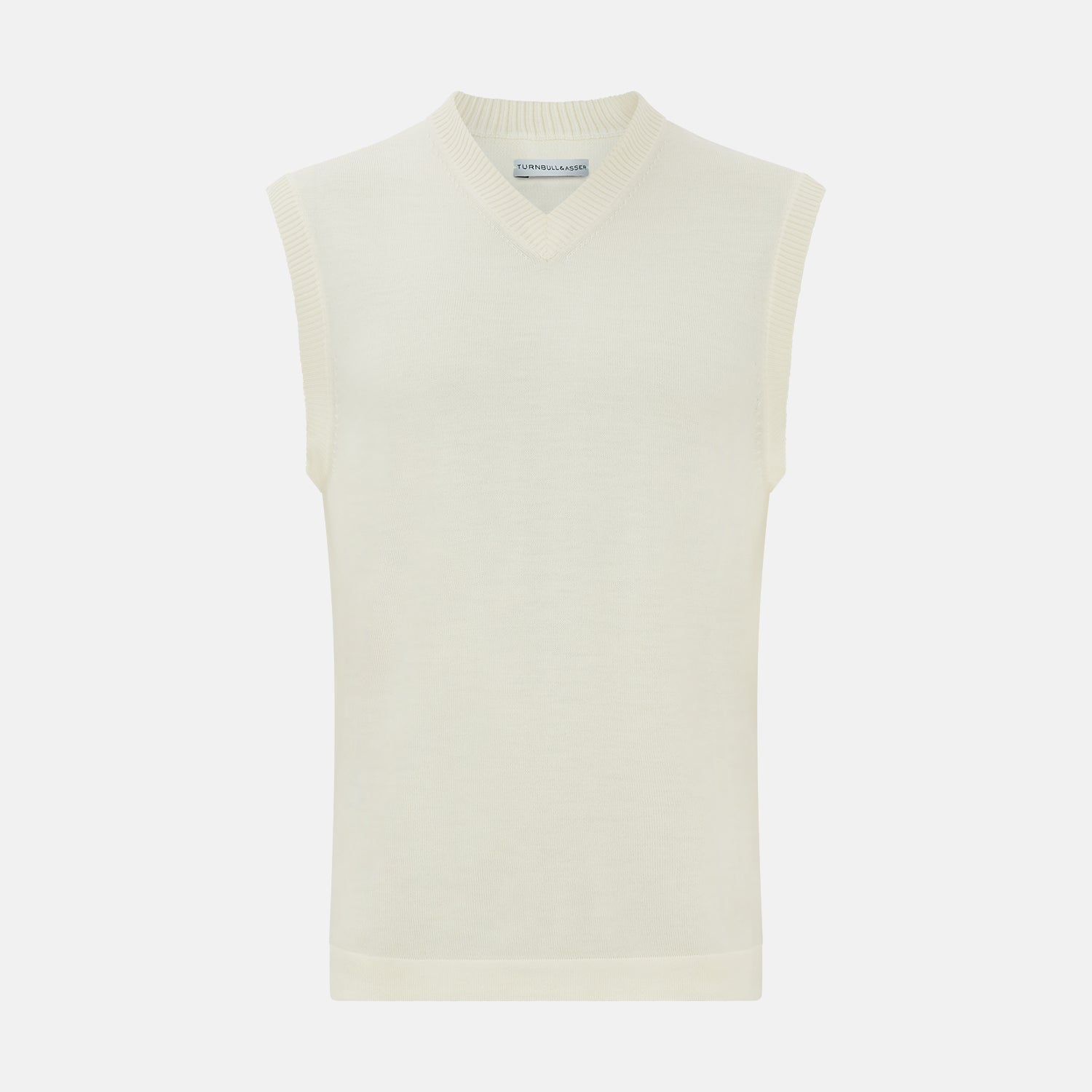 View 1 of product The Turnbull & Asser Cream Fine Merino V-Neck Vest is a sleeveless knit with ribbed edges, ideal for a refined modern look. Shown on a plain white background.