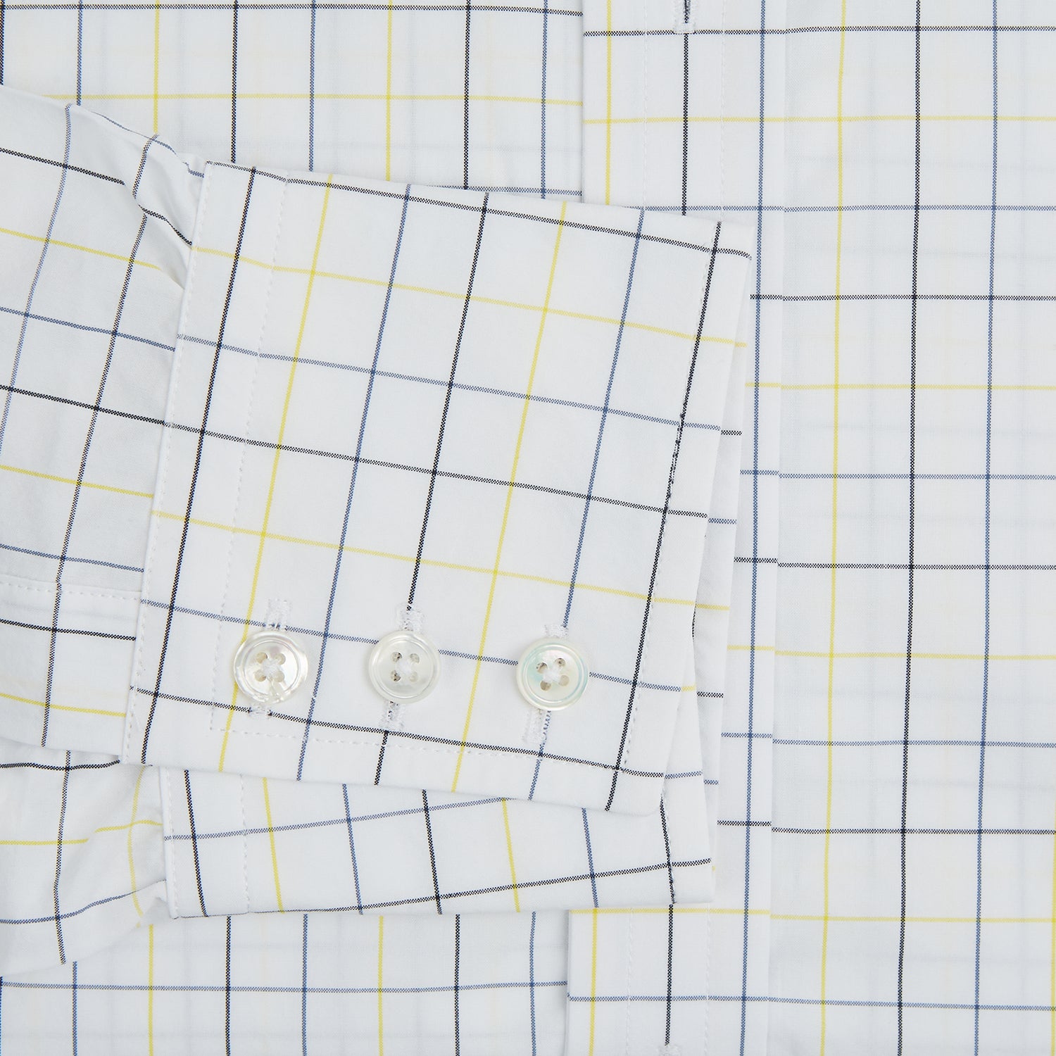View 4 of product The Turnbull & Asser Yellow and Blue Grid Check Mayfair Shirt features a long-sleeve button-up design with a yellow and blue grid pattern, shown against a plain white background.