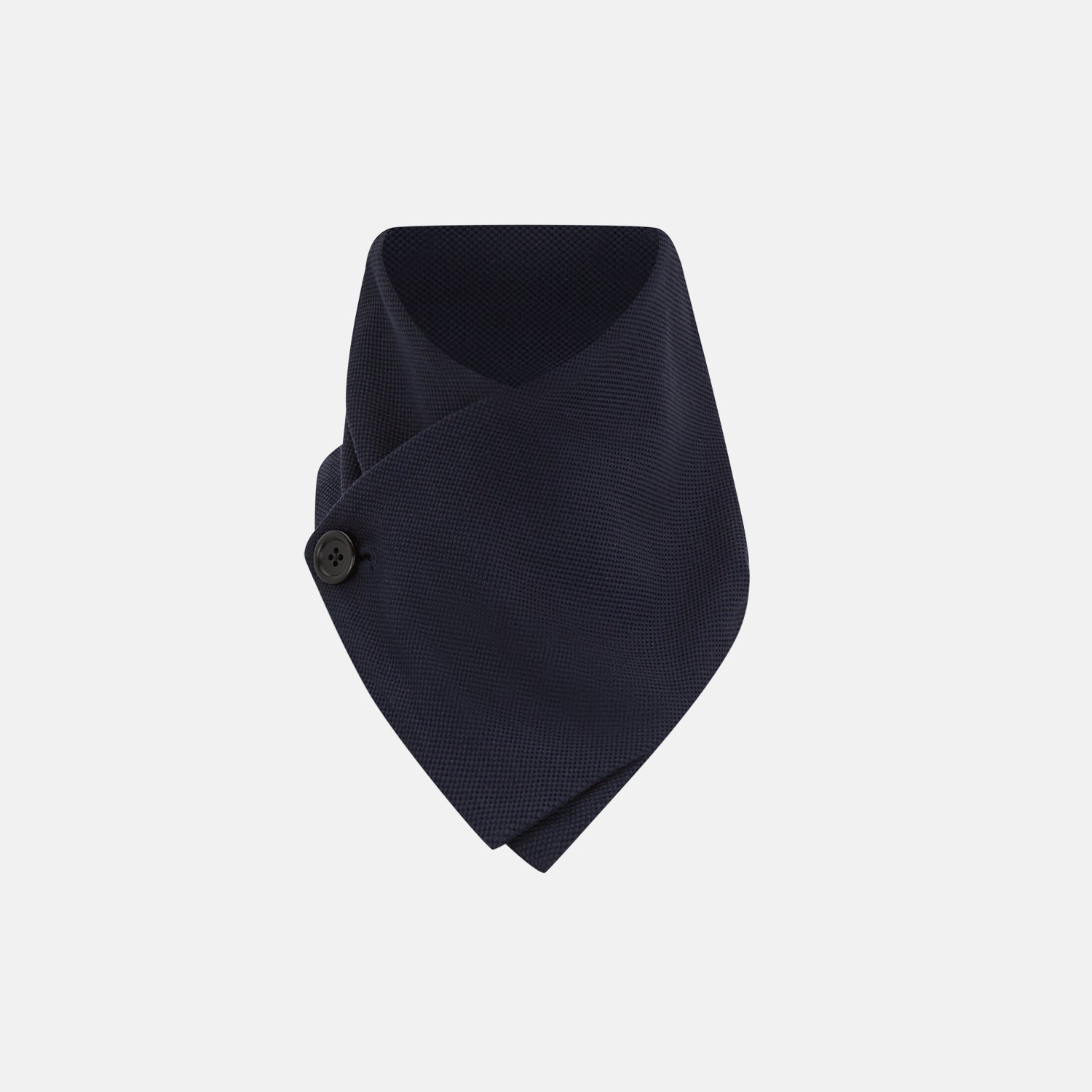 View 1 of product The Turnbull & Asser Navy Silk and Cotton Neck Warmer features a dark navy blue textured fabric and a single black button, shown against a plain light gray background.