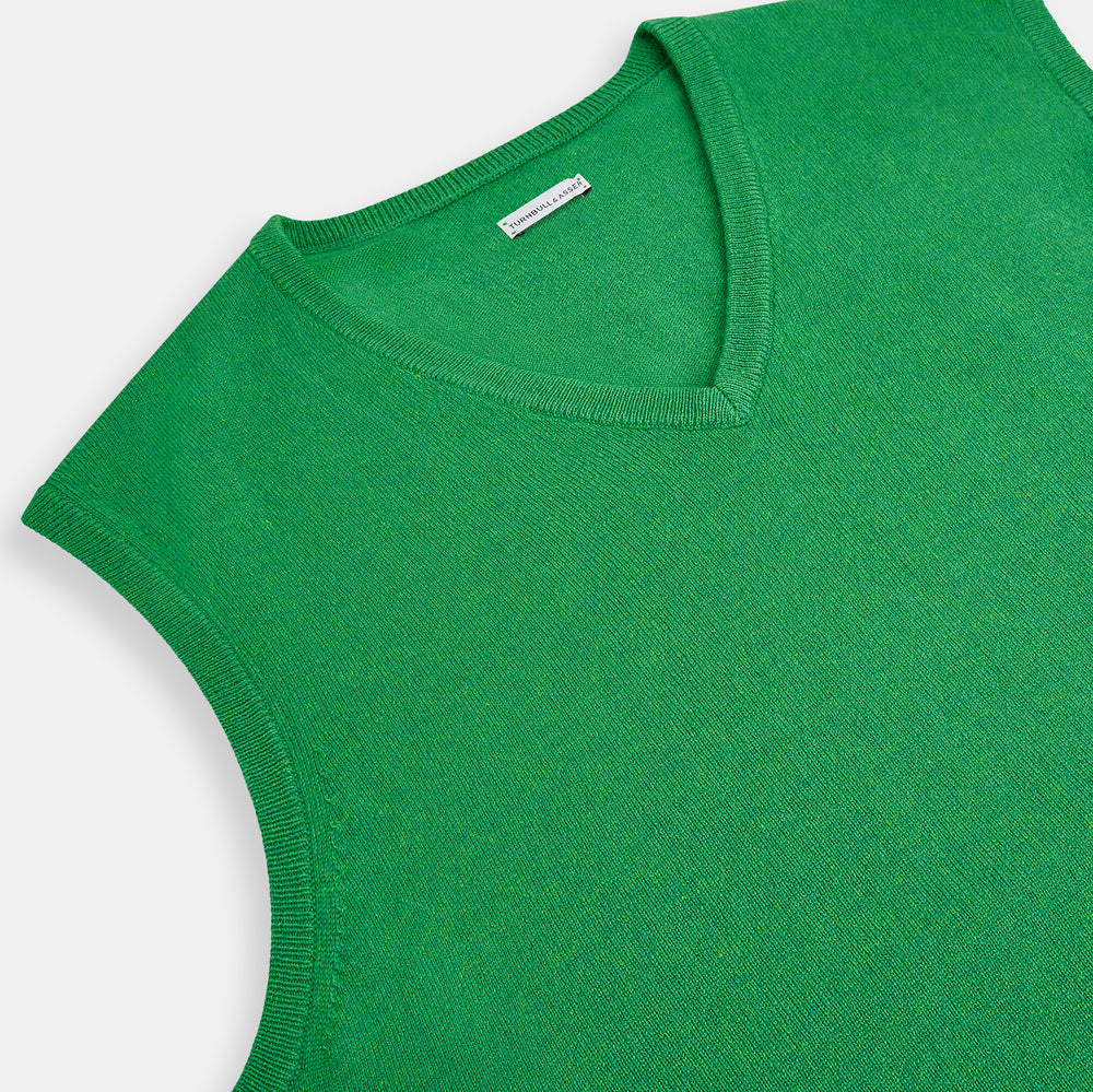 The Fern Green Cashmere V-Neck Vest by Turnbull & Asser is a men's sleeveless jumper, ideal for layering, shown against a plain white background.