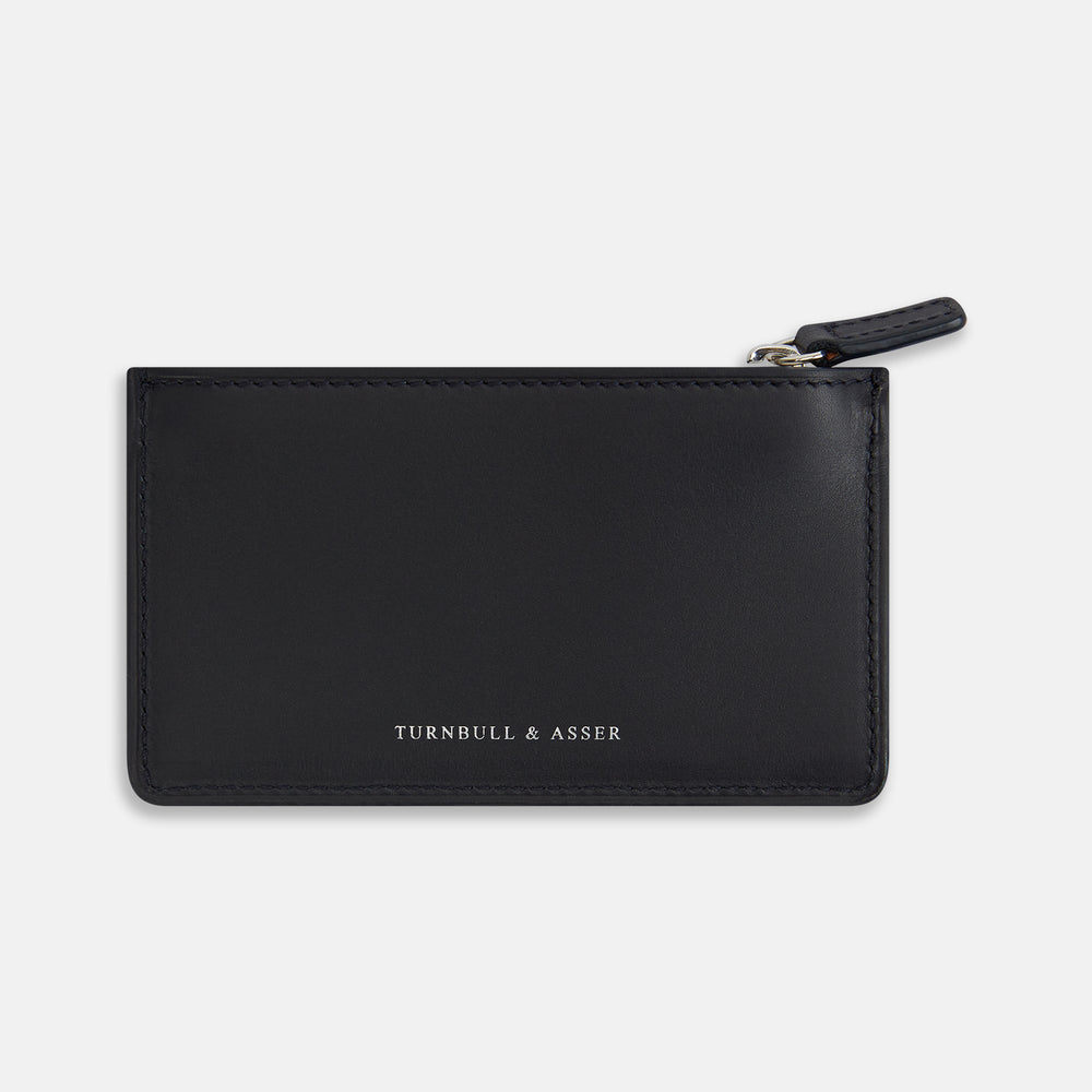 A navy leather zip wallet with Turnbull & Asser printed in small white letters on the front, set against a plain white background.
