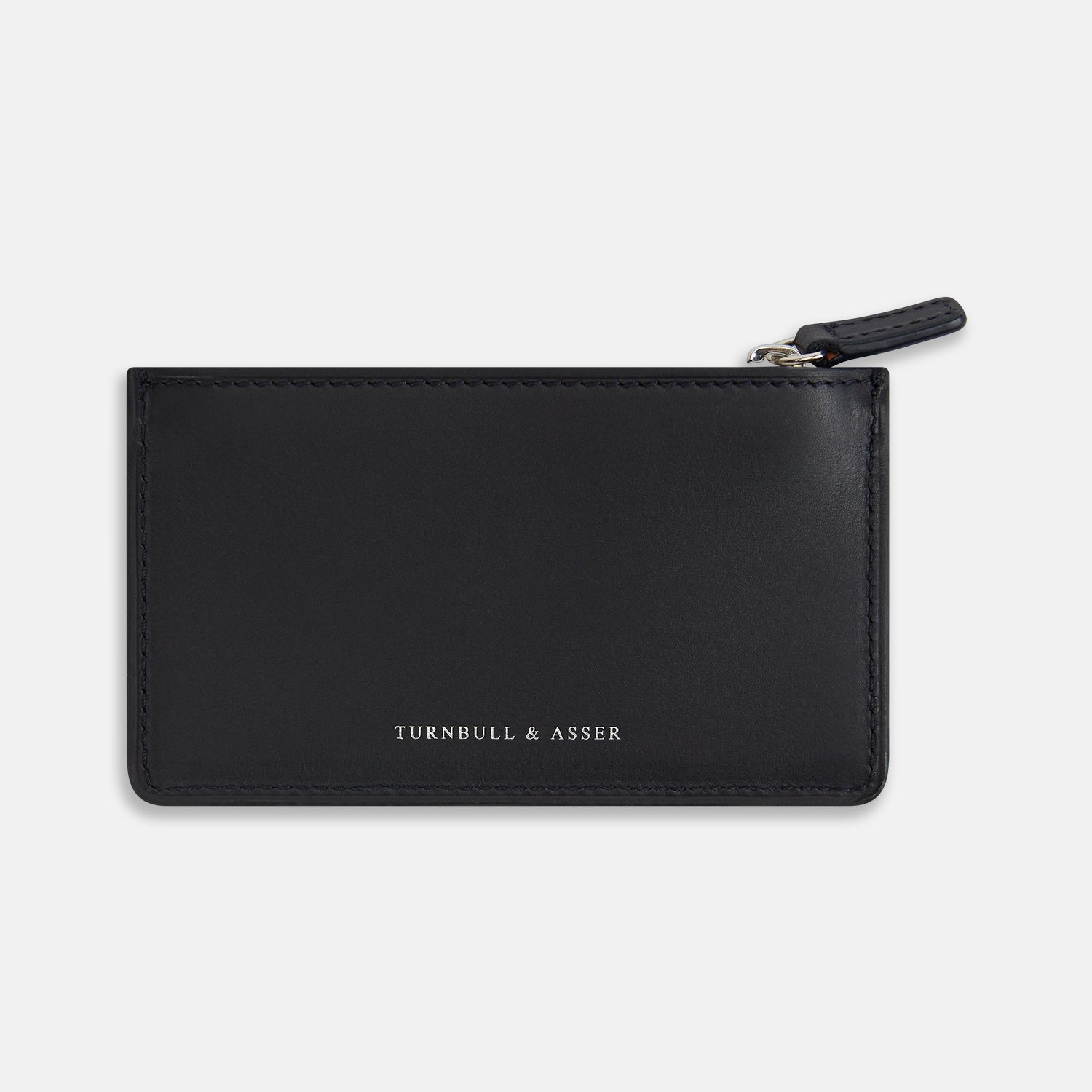 View 1 of product A navy leather zip wallet with Turnbull & Asser printed in small white letters on the front, set against a plain white background.