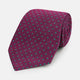 A smart accessory, the Antique Pink and Green Micro Dot Silk Tie by Turnbull & Asser is a striking spotted silk tie displayed on a white background.