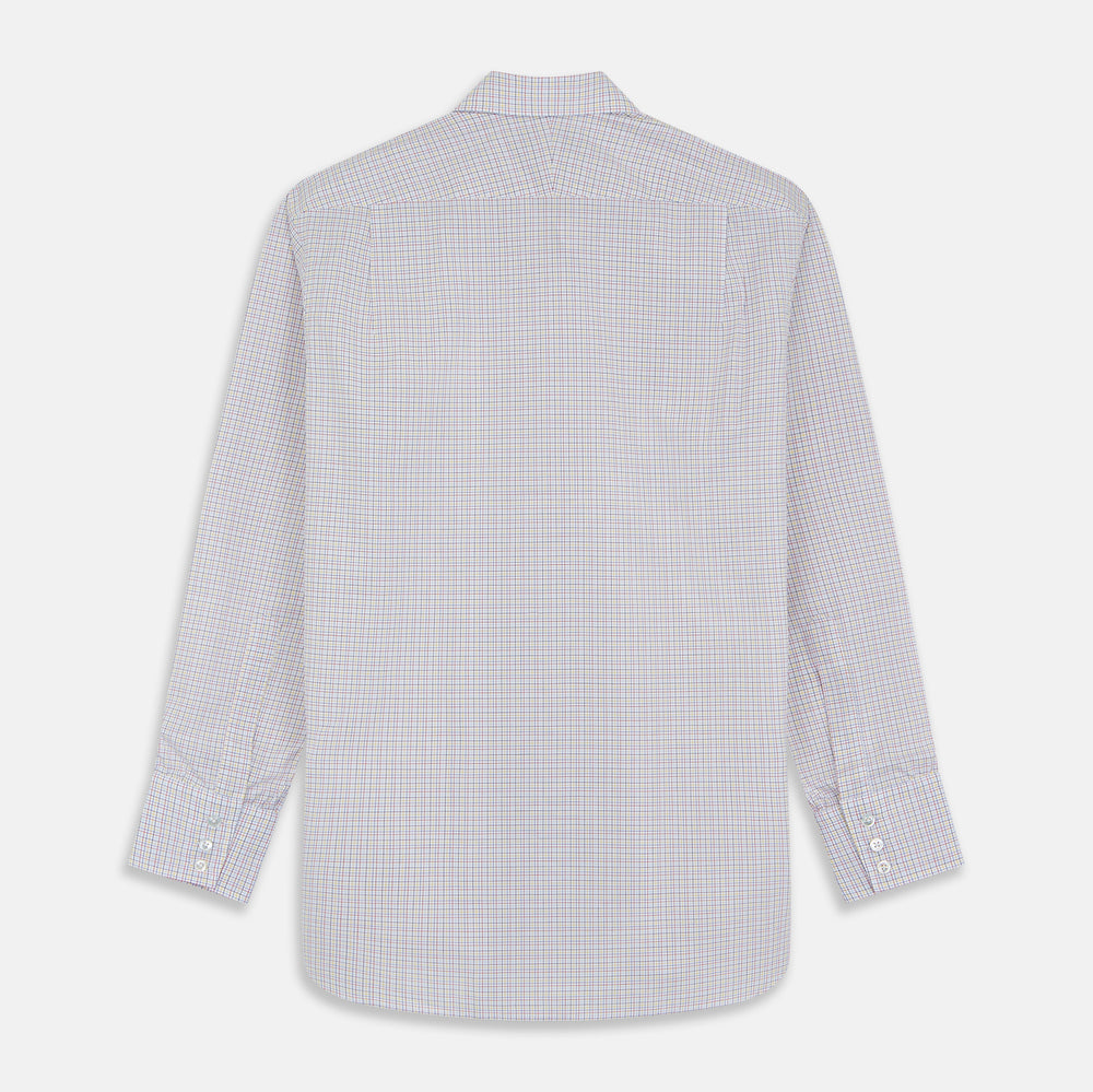A man stands against a beige background, facing forward with a neutral expression and arms relaxed, wearing the Turnbull & Asser Red Multi Check Regular Fit Mayfair Shirt.