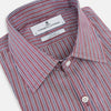 View 2 of product The Turnbull & Asser Wine Ticking Stripe Westminster Shirt features red, blue, and white vertical pinstripes on white and is shown laid flat on a white surface.