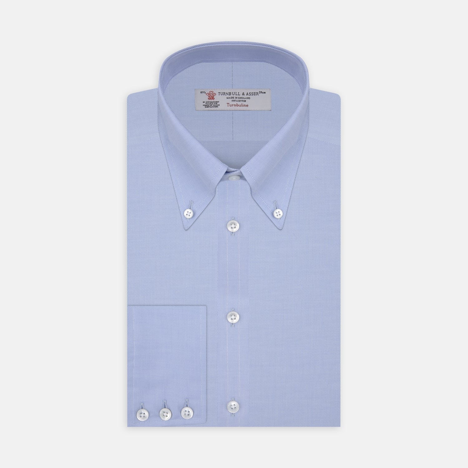 View 1 of product The Turnbull & Asser Light Blue Royal Oxford Cotton Shirt features a button-down collar, 3-button cuffs, and white buttons. Neatly folded with a visible inner label, it’s ideal to pair with a navy suit and displayed on a plain white background.
