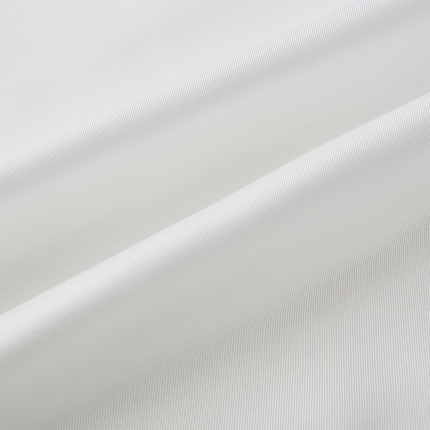 View 3 of product The Turnbull & Asser White Silk Scarf features fringed edges and discreet black branding in the corner, making it a refined accessory for tuxedo jackets or formal wear. Presented neatly folded on a plain white background.