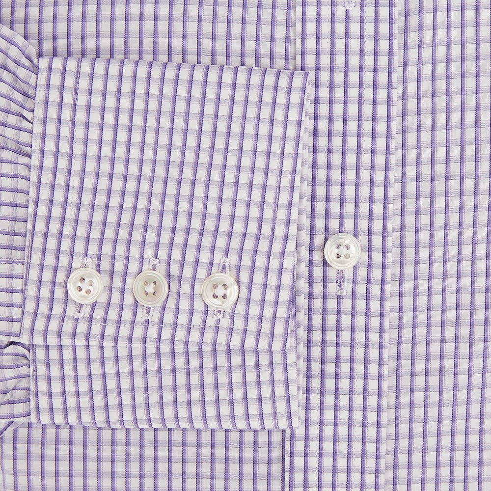 The Turnbull & Asser Purple Micro Shadow Check Mayfair Shirt features long sleeves, a classic collar, white buttons, and a subtle blue and white check pattern—perfect for formal wear and shown on a plain white background.