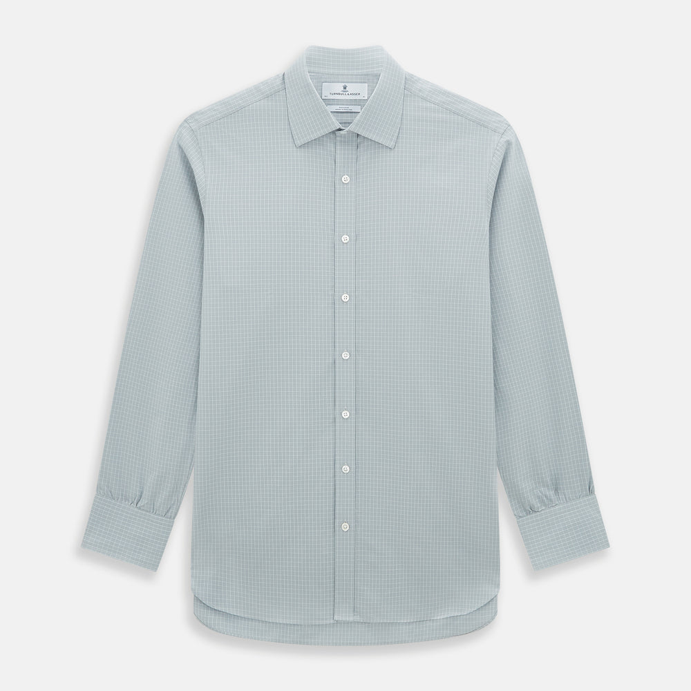 Turnbull & Asser Pale Blue Fine Check Mayfair Shirt—a long-sleeve button-up with classic collar, buttoned cuffs, white buttons, and a subtle check pattern in sanforised cotton—displayed on a white background.