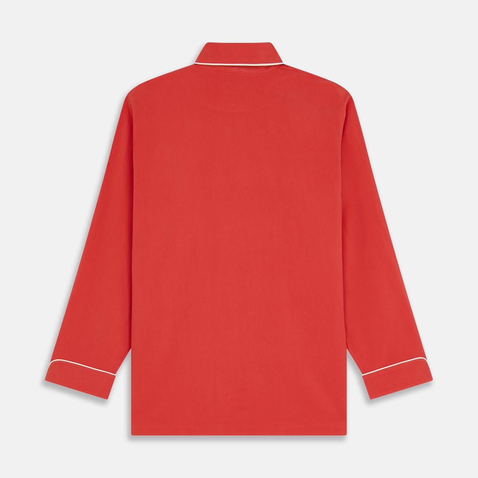 View 7 of product The Turnbull & Asser Women's Coral Pink Silk Thelma Pyjama Set features a long-sleeve button-up top with two front pockets and matching drawstring pants, shown on a white background.